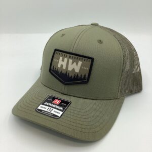 Green and gray mesh trucker hat with HW logo patch.