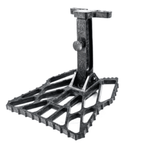 Metal foot pedal with textured surface.